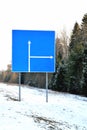 Road sign on winter road,  copy space Royalty Free Stock Photo